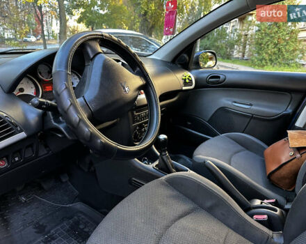 Синій Пежо 206, об'ємом двигуна 1.12 л та пробігом 178 тис. км за 4400 $, фото 11 на Automoto.ua
