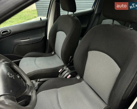 Синий Пежо 206, объемом двигателя 1.36 л и пробегом 217 тыс. км за 3150 $, фото 17 на Automoto.ua