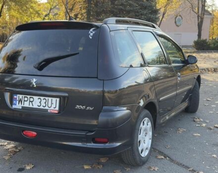 Синий Пежо 206, объемом двигателя 1.4 л и пробегом 230 тыс. км за 2450 $, фото 3 на Automoto.ua