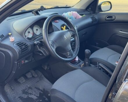 Синий Пежо 206, объемом двигателя 1.4 л и пробегом 230 тыс. км за 2450 $, фото 4 на Automoto.ua
