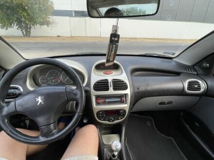 Синій Пежо 206, об'ємом двигуна 2 л та пробігом 200 тис. км за 2000 $, фото 1 на Automoto.ua