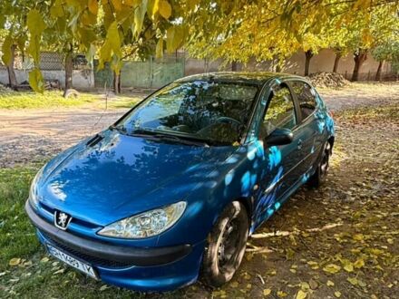 Синий Пежо 206, объемом двигателя 1.4 л и пробегом 197 тыс. км за 3400 $, фото 1 на Automoto.ua