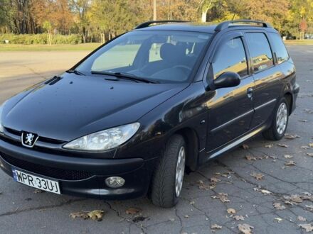 Синий Пежо 206, объемом двигателя 1.4 л и пробегом 230 тыс. км за 2450 $, фото 1 на Automoto.ua