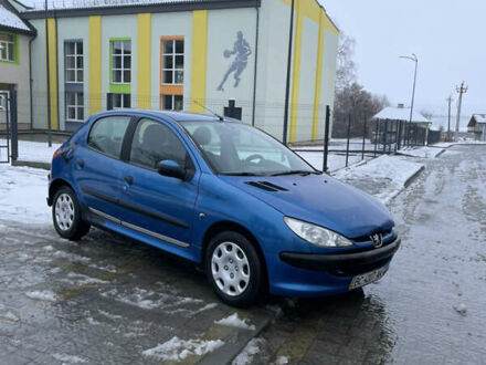 Синий Пежо 206, объемом двигателя 1.4 л и пробегом 242 тыс. км за 1999 $, фото 1 на Automoto.ua