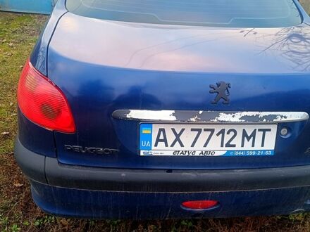 Синий Пежо 206, объемом двигателя 1.4 л и пробегом 230 тыс. км за 700 $, фото 1 на Automoto.ua