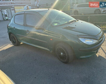 Зеленый Пежо 206, объемом двигателя 1.1 л и пробегом 323 тыс. км за 2000 $, фото 2 на Automoto.ua