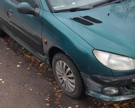 Зеленый Пежо 206, объемом двигателя 1.8 л и пробегом 250 тыс. км за 1100 $, фото 1 на Automoto.ua