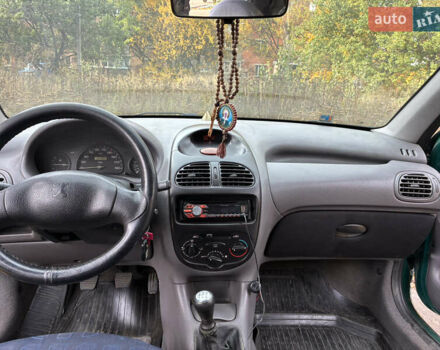 Зеленый Пежо 206, объемом двигателя 1.1 л и пробегом 323 тыс. км за 2000 $, фото 5 на Automoto.ua