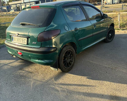 Зеленый Пежо 206, объемом двигателя 1.1 л и пробегом 323 тыс. км за 2000 $, фото 1 на Automoto.ua