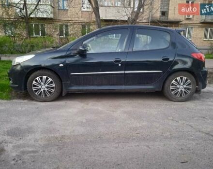Зелений Пежо 206, об'ємом двигуна 1.36 л та пробігом 194 тис. км за 2500 $, фото 23 на Automoto.ua