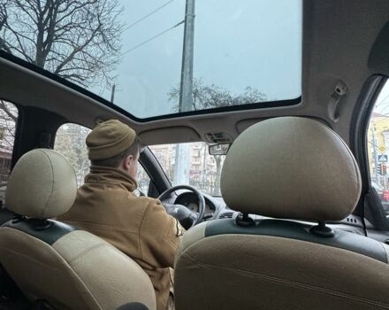 Зеленый Пежо 206, объемом двигателя 1.4 л и пробегом 200 тыс. км за 3750 $, фото 7 на Automoto.ua