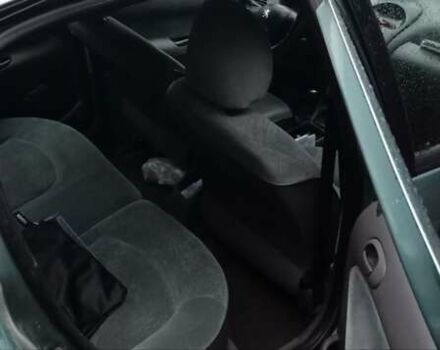 Зелений Пежо 206, об'ємом двигуна 1.36 л та пробігом 370 тис. км за 3000 $, фото 3 на Automoto.ua