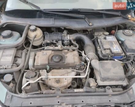 Зелений Пежо 206, об'ємом двигуна 1.36 л та пробігом 200 тис. км за 3300 $, фото 5 на Automoto.ua