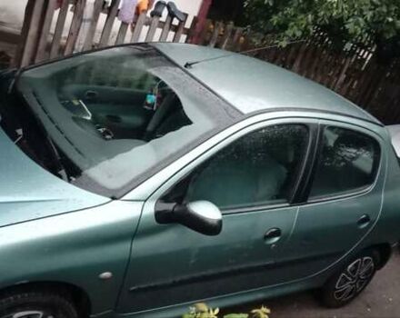 Зелений Пежо 206, об'ємом двигуна 1.36 л та пробігом 370 тис. км за 3000 $, фото 5 на Automoto.ua