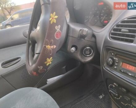 Зелений Пежо 206, об'ємом двигуна 1.36 л та пробігом 200 тис. км за 3300 $, фото 9 на Automoto.ua