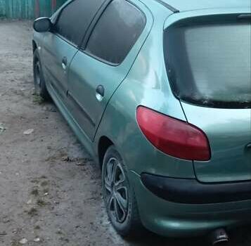 Зелений Пежо 206, об'ємом двигуна 1.36 л та пробігом 370 тис. км за 3000 $, фото 8 на Automoto.ua