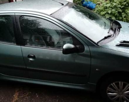 Зелений Пежо 206, об'ємом двигуна 1.36 л та пробігом 370 тис. км за 3000 $, фото 7 на Automoto.ua