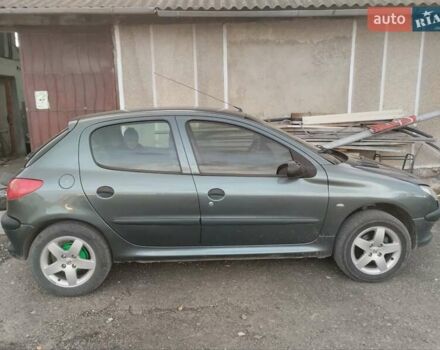 Зелений Пежо 206, об'ємом двигуна 1.36 л та пробігом 200 тис. км за 3300 $, фото 7 на Automoto.ua