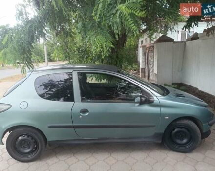 Зеленый Пежо 206, объемом двигателя 1.12 л и пробегом 280 тыс. км за 2800 $, фото 3 на Automoto.ua