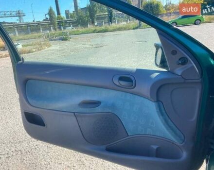 Зелений Пежо 206, об'ємом двигуна 1.36 л та пробігом 220 тис. км за 2900 $, фото 28 на Automoto.ua