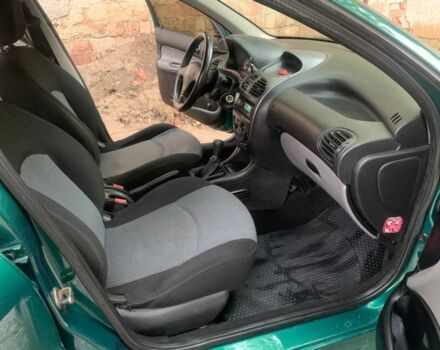 Зелений Пежо 206, об'ємом двигуна 1.4 л та пробігом 234 тис. км за 3993 $, фото 9 на Automoto.ua