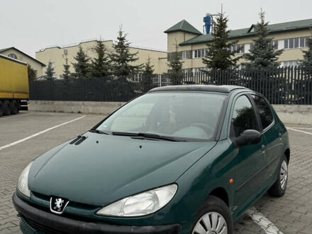 Зеленый Пежо 206, объемом двигателя 1.4 л и пробегом 239 тыс. км за 2300 $, фото 1 на Automoto.ua