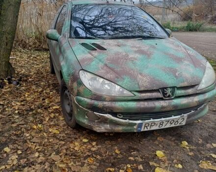 Зеленый Пежо 206, объемом двигателя 1.4 л и пробегом 311 тыс. км за 1118 $, фото 1 на Automoto.ua
