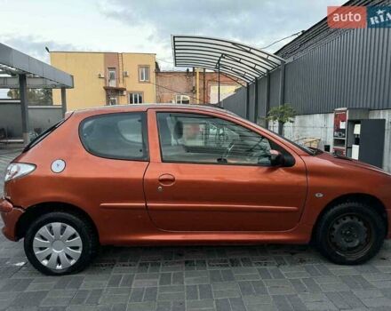 Оранжевый Пежо 206, объемом двигателя 1.12 л и пробегом 272 тыс. км за 1700 $, фото 1 на Automoto.ua