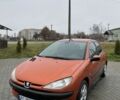 Помаранчевий Пежо 206, об'ємом двигуна 1.4 л та пробігом 143 тис. км за 2000 $, фото 4 на Automoto.ua