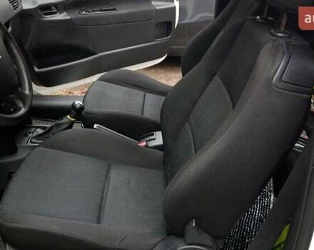 Белый Пежо 207, объемом двигателя 1.4 л и пробегом 205 тыс. км за 3500 $, фото 13 на Automoto.ua