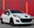 Белый Пежо 207, объемом двигателя 1.4 л и пробегом 213 тыс. км за 4011 $, фото 1 на Automoto.ua