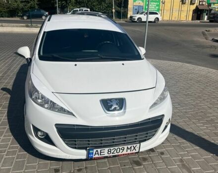 Белый Пежо 207, объемом двигателя 1.4 л и пробегом 200 тыс. км за 5900 $, фото 1 на Automoto.ua