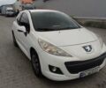 Белый Пежо 207, объемом двигателя 1.4 л и пробегом 195 тыс. км за 3550 $, фото 1 на Automoto.ua