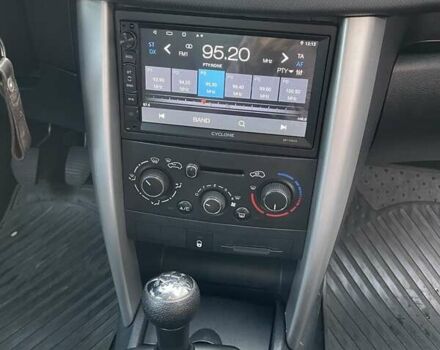 Белый Пежо 207, объемом двигателя 1.36 л и пробегом 156 тыс. км за 4400 $, фото 14 на Automoto.ua