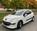 Белый Пежо 207, объемом двигателя 1.4 л и пробегом 140 тыс. км за 3950 $, фото 1 на Automoto.ua