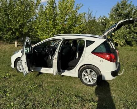 Белый Пежо 207, объемом двигателя 1.6 л и пробегом 240 тыс. км за 4699 $, фото 19 на Automoto.ua