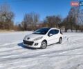 Белый Пежо 207, объемом двигателя 1.36 л и пробегом 199 тыс. км за 5950 $, фото 1 на Automoto.ua