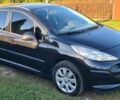 Черный Пежо 207, объемом двигателя 1.4 л и пробегом 153 тыс. км за 4200 $, фото 1 на Automoto.ua