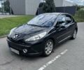 Черный Пежо 207, объемом двигателя 1.6 л и пробегом 144 тыс. км за 5700 $, фото 1 на Automoto.ua