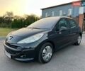 Черный Пежо 207, объемом двигателя 1.4 л и пробегом 200 тыс. км за 3900 $, фото 1 на Automoto.ua