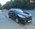 Черный Пежо 207, объемом двигателя 1.4 л и пробегом 187 тыс. км за 4750 $, фото 1 на Automoto.ua