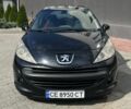 Черный Пежо 207, объемом двигателя 1.6 л и пробегом 158 тыс. км за 4800 $, фото 1 на Automoto.ua