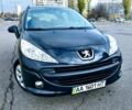 Черный Пежо 207, объемом двигателя 1.4 л и пробегом 225 тыс. км за 5299 $, фото 1 на Automoto.ua