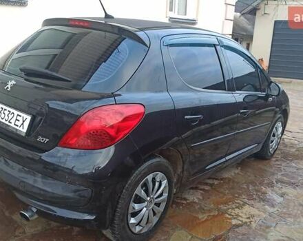 Черный Пежо 207, объемом двигателя 1.6 л и пробегом 280 тыс. км за 4850 $, фото 3 на Automoto.ua
