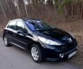 Черный Пежо 207, объемом двигателя 1.6 л и пробегом 260 тыс. км за 3600 $, фото 1 на Automoto.ua