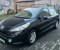 Черный Пежо 207, объемом двигателя 1.6 л и пробегом 220 тыс. км за 5500 $, фото 1 на Automoto.ua