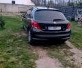 Черный Пежо 207, объемом двигателя 1.6 л и пробегом 210 тыс. км за 5000 $, фото 1 на Automoto.ua