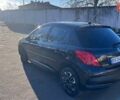 Черный Пежо 207, объемом двигателя 1.36 л и пробегом 145 тыс. км за 4900 $, фото 3 на Automoto.ua