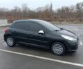 Черный Пежо 207, объемом двигателя 1.4 л и пробегом 199 тыс. км за 4150 $, фото 1 на Automoto.ua