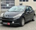 Черный Пежо 207, объемом двигателя 1.6 л и пробегом 263 тыс. км за 5390 $, фото 1 на Automoto.ua